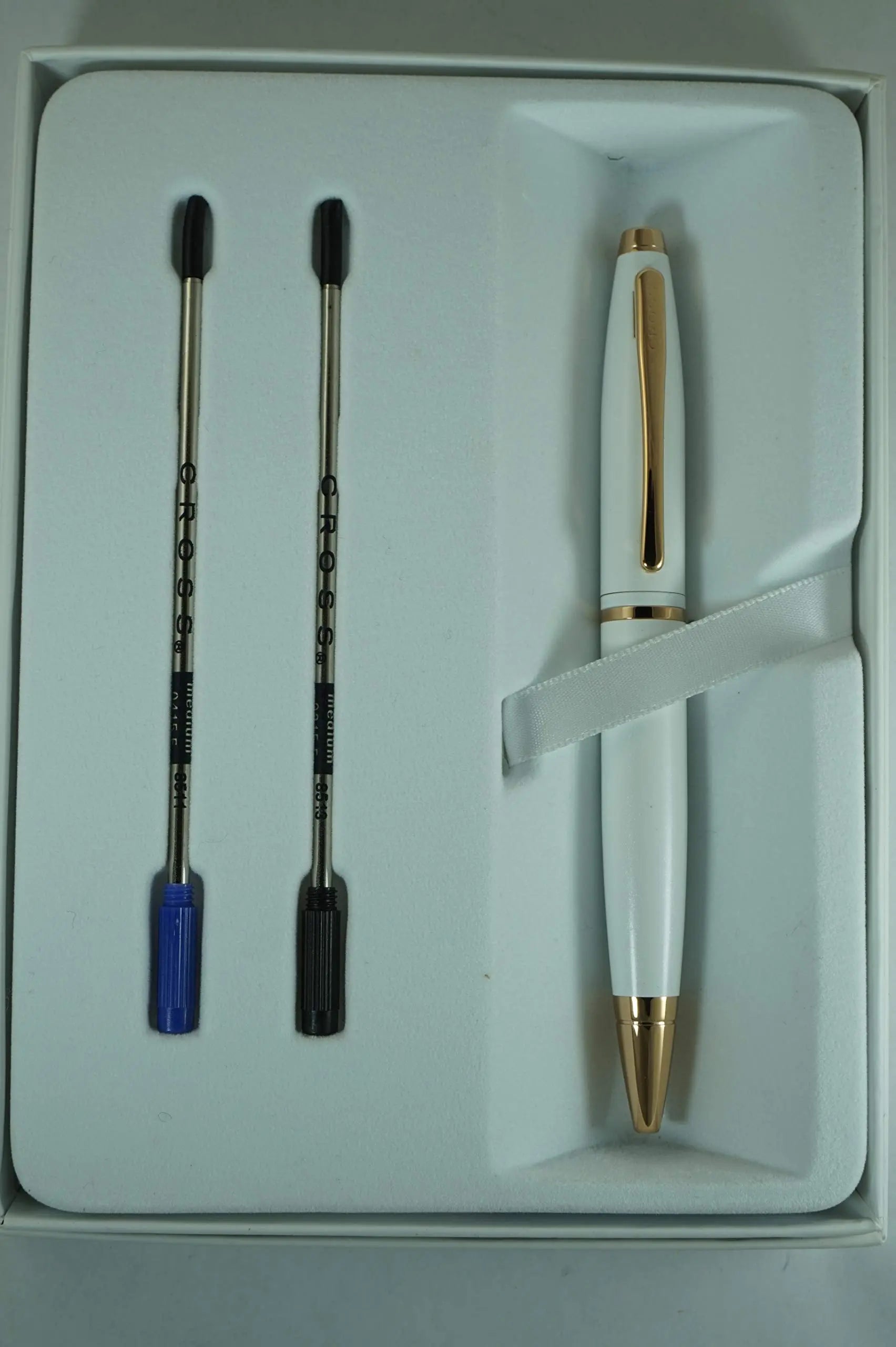 A.T. Cross Pearlescent White Medalist and 23KT Rose Gold Appointments and Cross signature mid Band Calaise Ballpoint Pen and two Bonus refills . A Gift Pen for Anyone and Any Occasion - crosspenmall.com