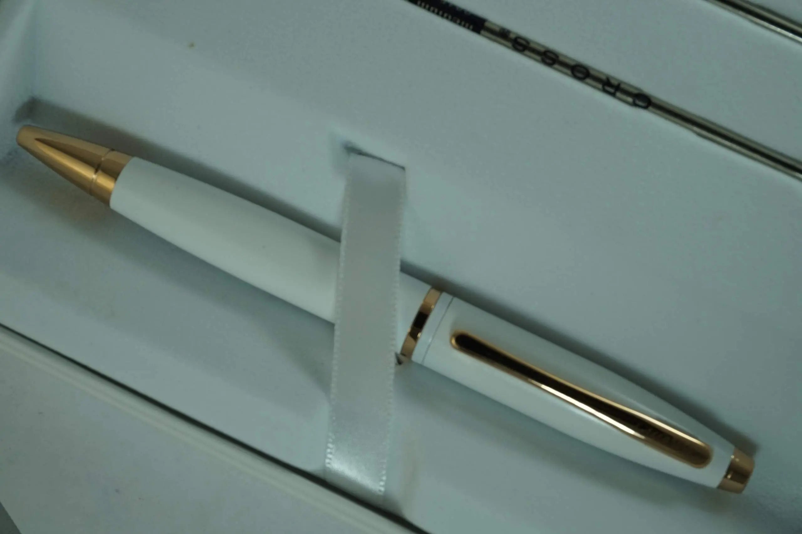 A.T. Cross Pearlescent White Medalist and 23KT Rose Gold Appointments and Cross signature mid Band Calaise Ballpoint Pen and two Bonus refills . A Gift Pen for Anyone and Any Occasion - crosspenmall.com