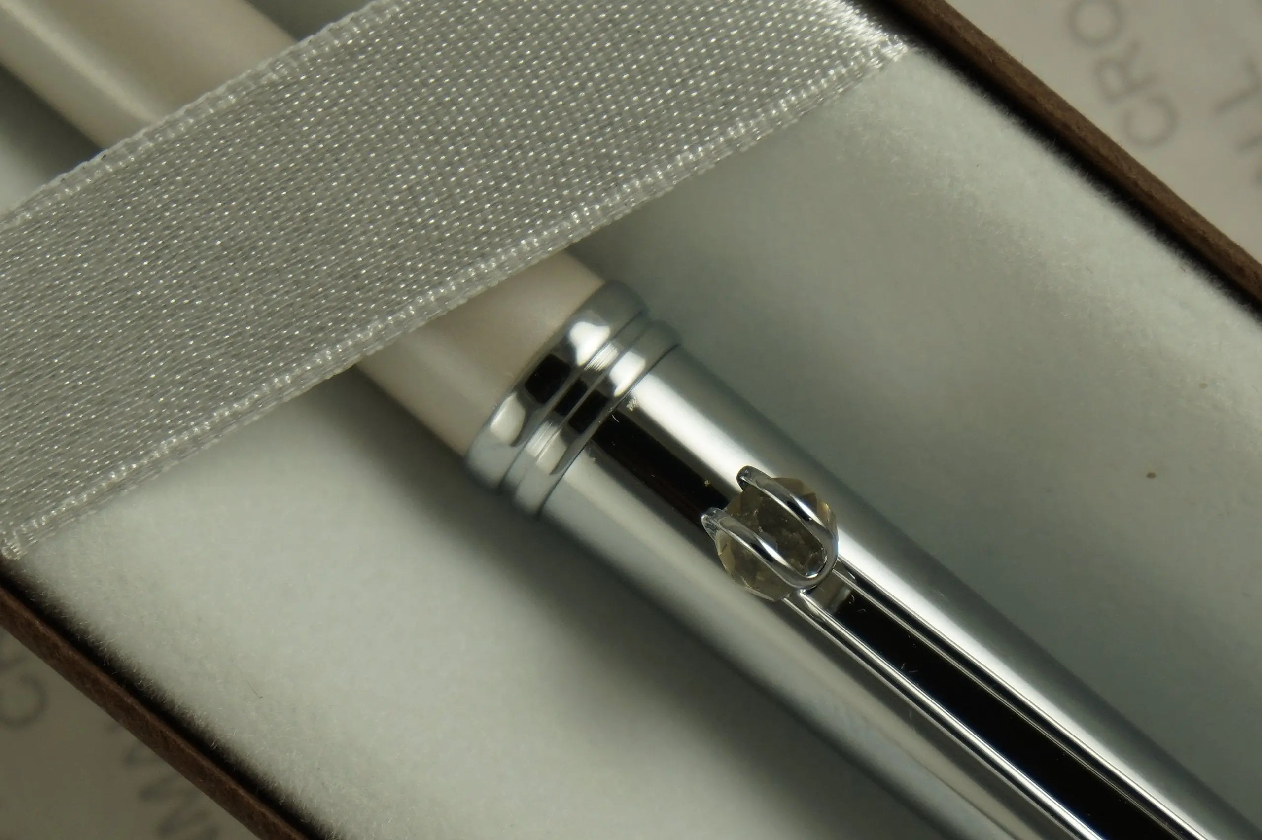 Cross Elite Stylist Ball Point Writing Pen with Faceted Crystal Teardrop Ball on Clip and Accented in Pearlescent Shell Ivory White Barrel and Extremely Polished Cap. Cross
