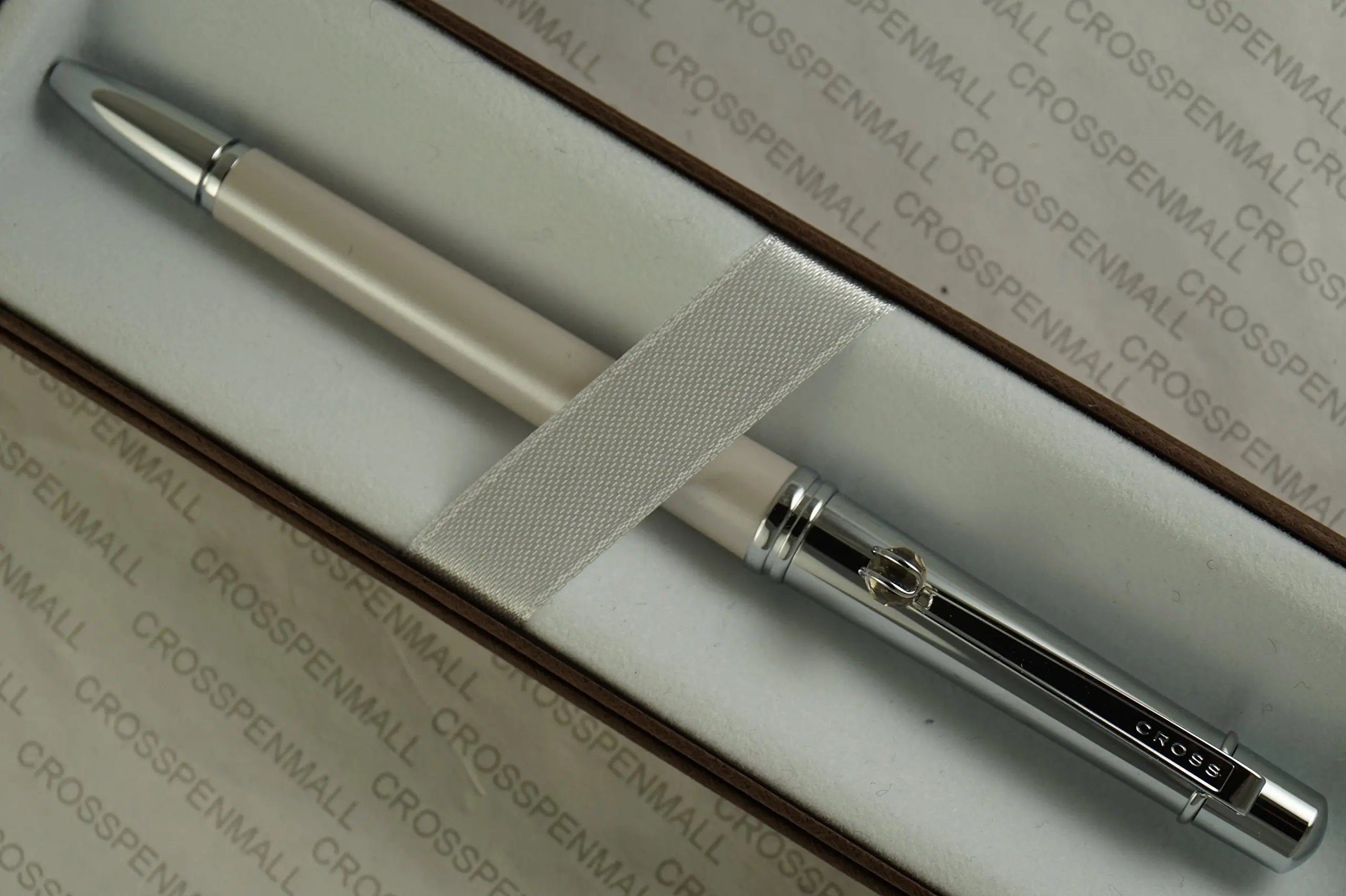 Cross Elite Stylist Ball Point Writing Pen with Faceted Crystal Teardrop Ball on Clip and Accented in Pearlescent Shell Ivory White Barrel and Extremely Polished Cap. Cross