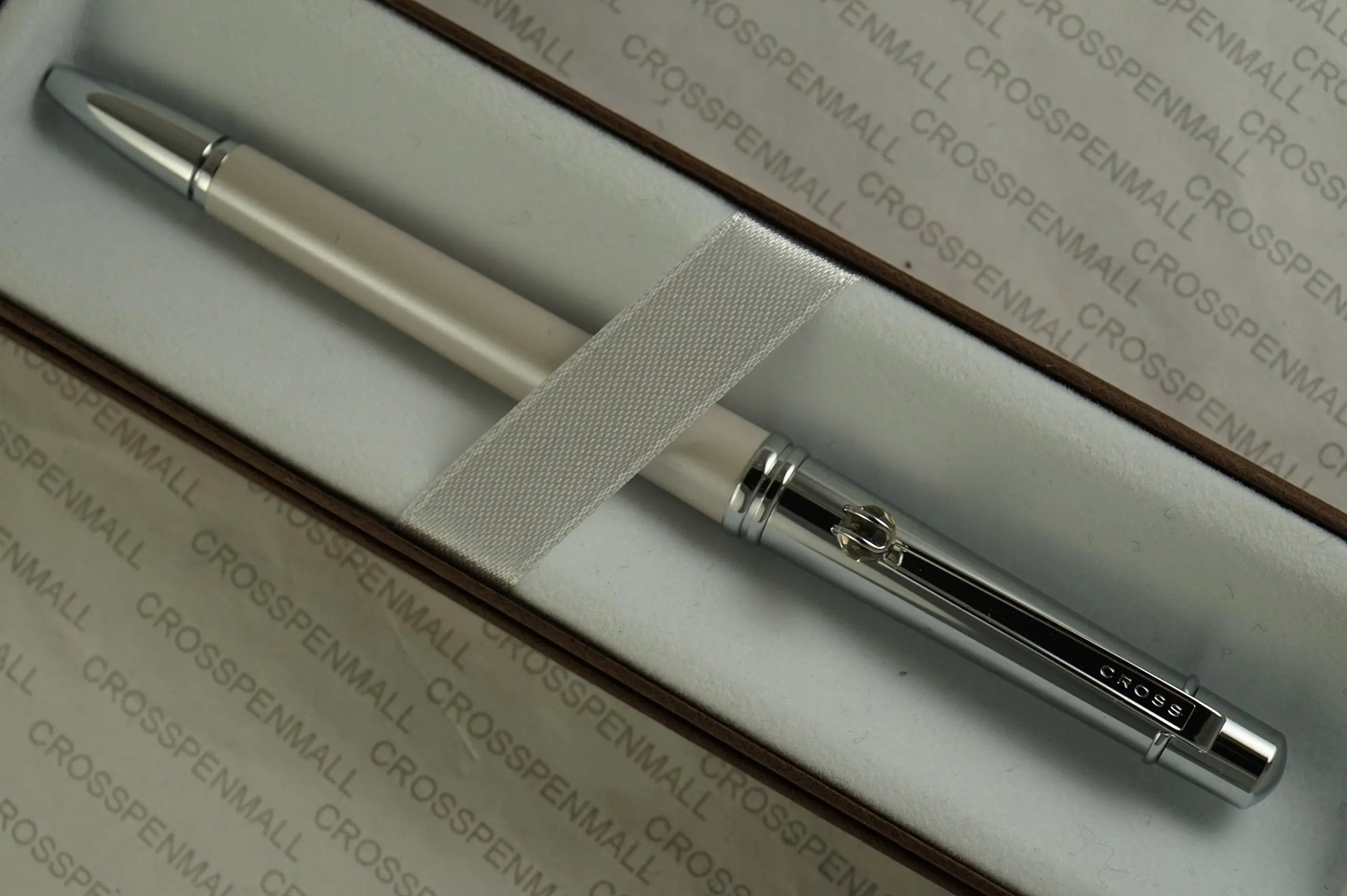 Cross Elite Stylist Ball Point Writing Pen with Faceted Crystal Teardrop Ball on Clip and Accented in Pearlescent Shell Ivory White Barrel and Extremely Polished Cap. Cross