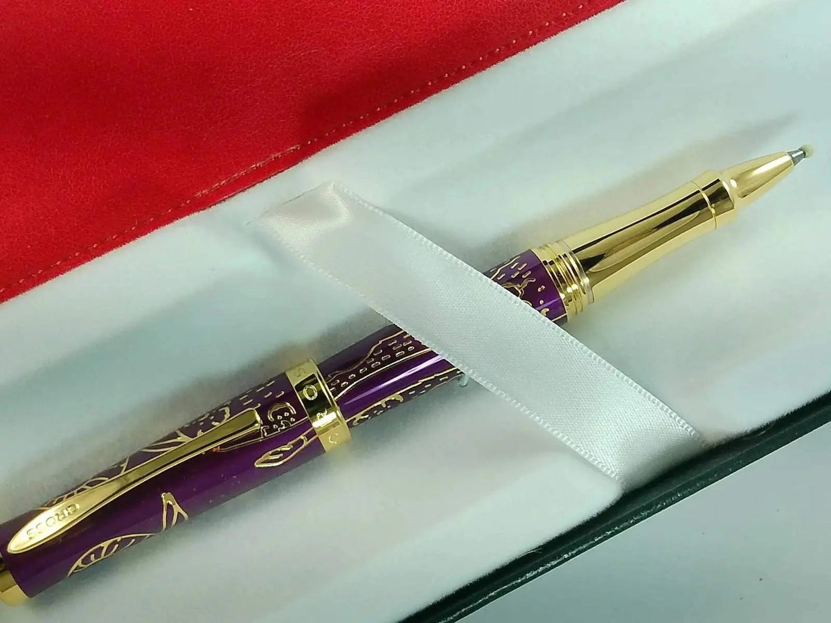 Cross Sauvage 2021 Year of the Ox Special-Edition, Hand-polished Translucent Plum lacquer finish with deep-etched Ox engraving, 23KT Gold Inlays and Appointments Selectip Rollerball Pen and Pouch cross