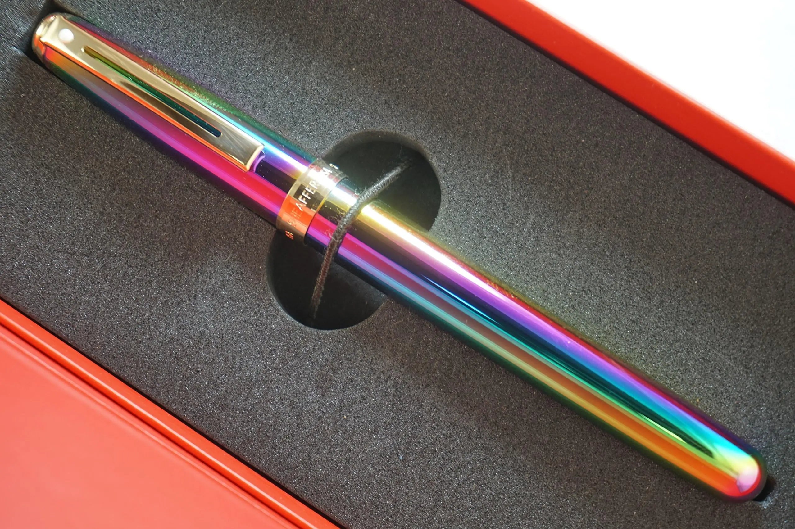 Sheaffer Made in the USA Signature Prelude Titanium oxide Rainbow 'Plasma' finish cap and barrel With 22KT Gold Appointments, Rollerball pen and Matching Gold Desk Clock Sheaffer