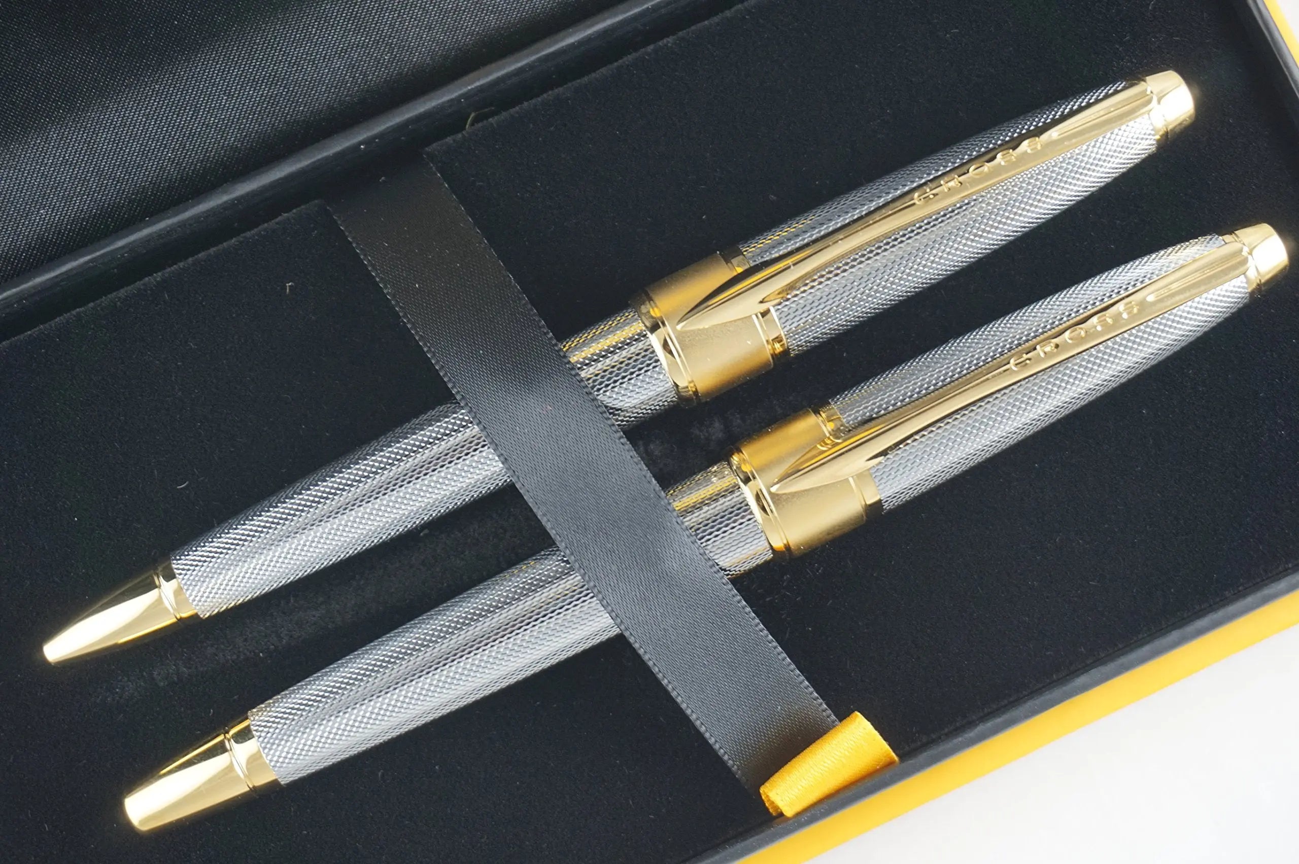 Cross Limited Edition in elegant haberdashery finishes Apogee Executive Diamond Cut Elegant 23KT Gold Medalist with Solid 18KT Gold nib Fountain pen and Ballpoint Pen A great corporate gift - crosspenmall.com