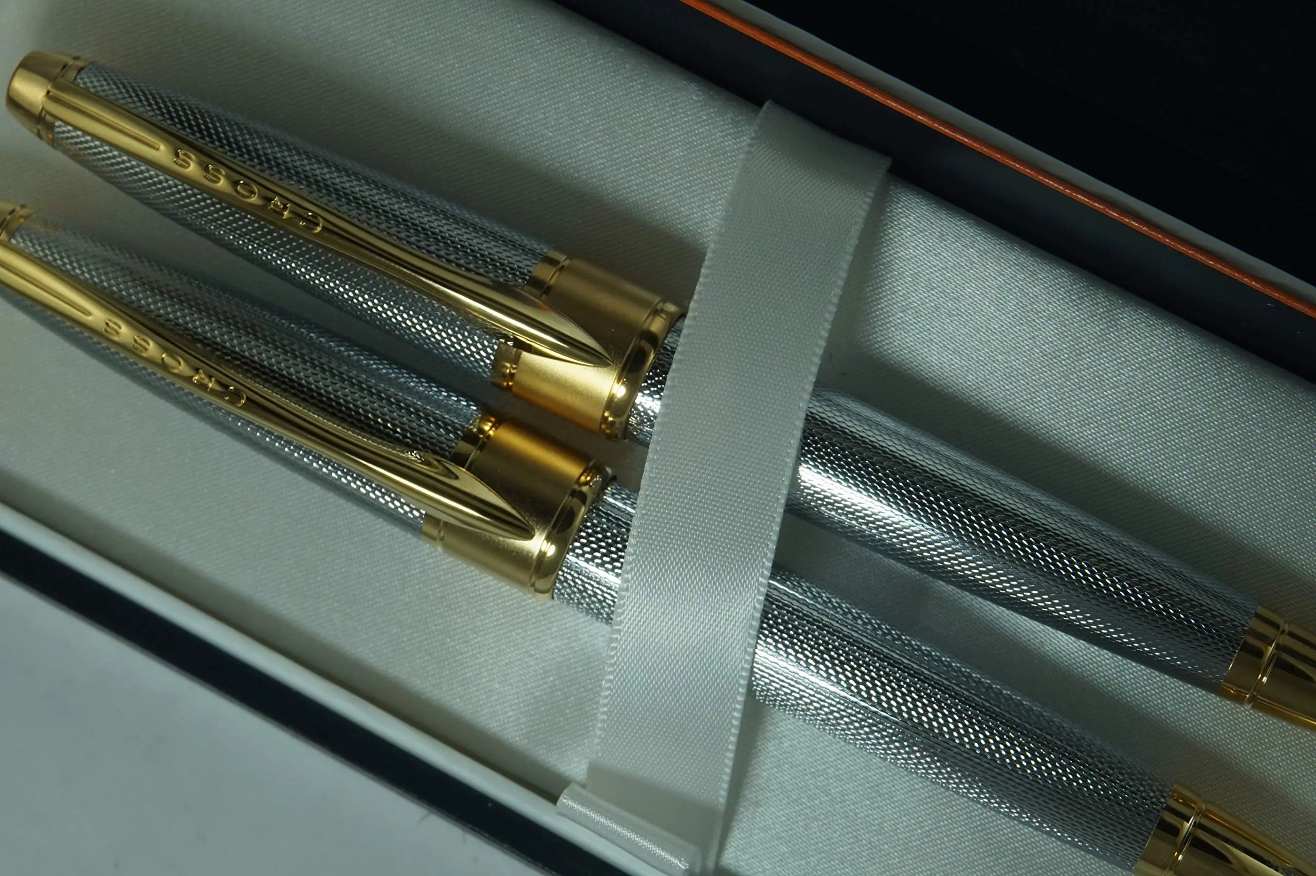 Cross Limited Edition in elegant haberdashery finishes Apogee Executive Diamond Cut Elegant Gold Medalist with Gold nib Fountain pen and Selectip Rollerball Pen A great corporate gift A.T.. CROSS