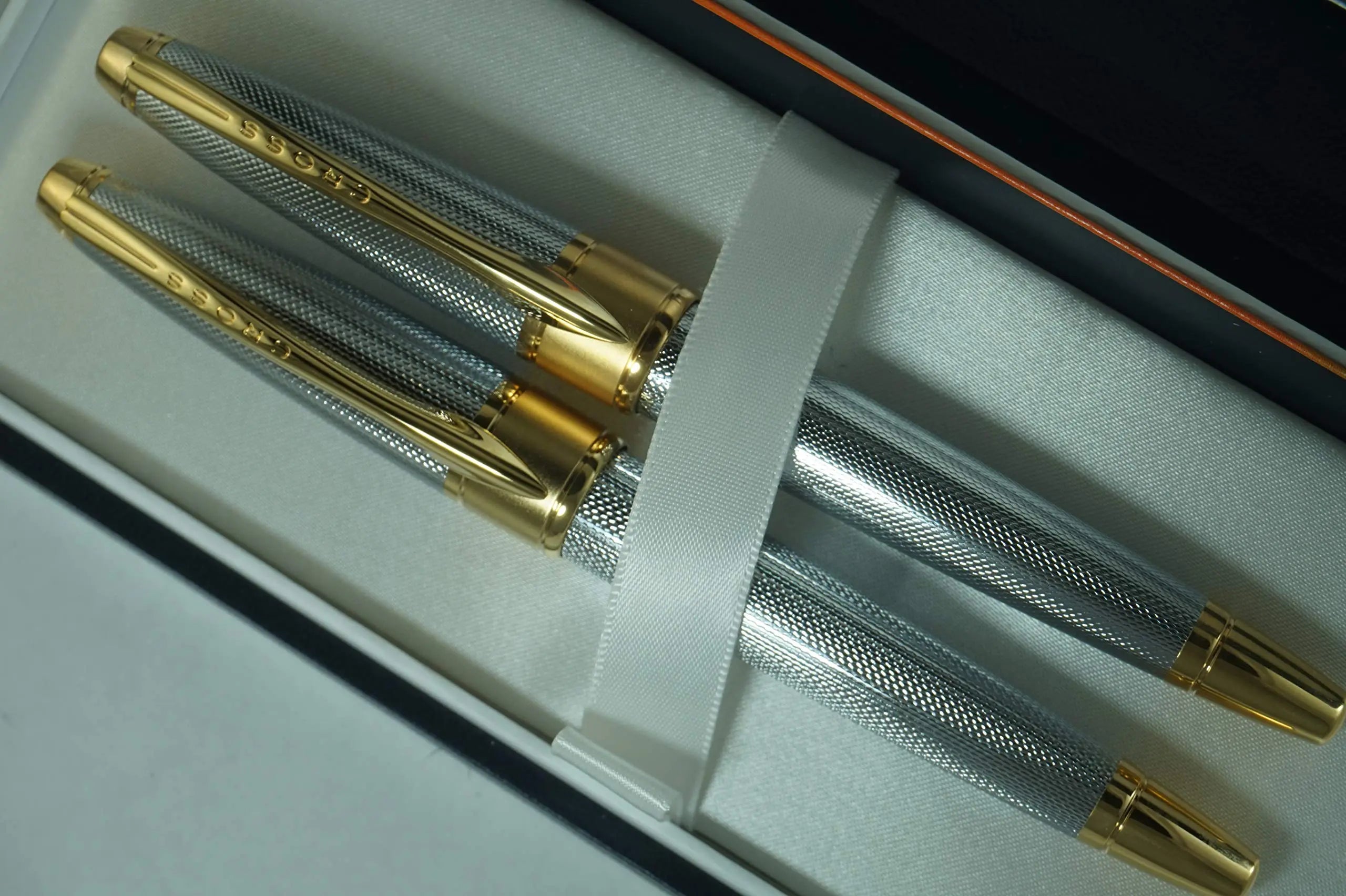 Cross Limited Edition in elegant haberdashery finishes Apogee Executive Diamond Cut Elegant Gold Medalist with Gold nib Fountain pen and Selectip Rollerball Pen A great corporate gift A.T.. CROSS