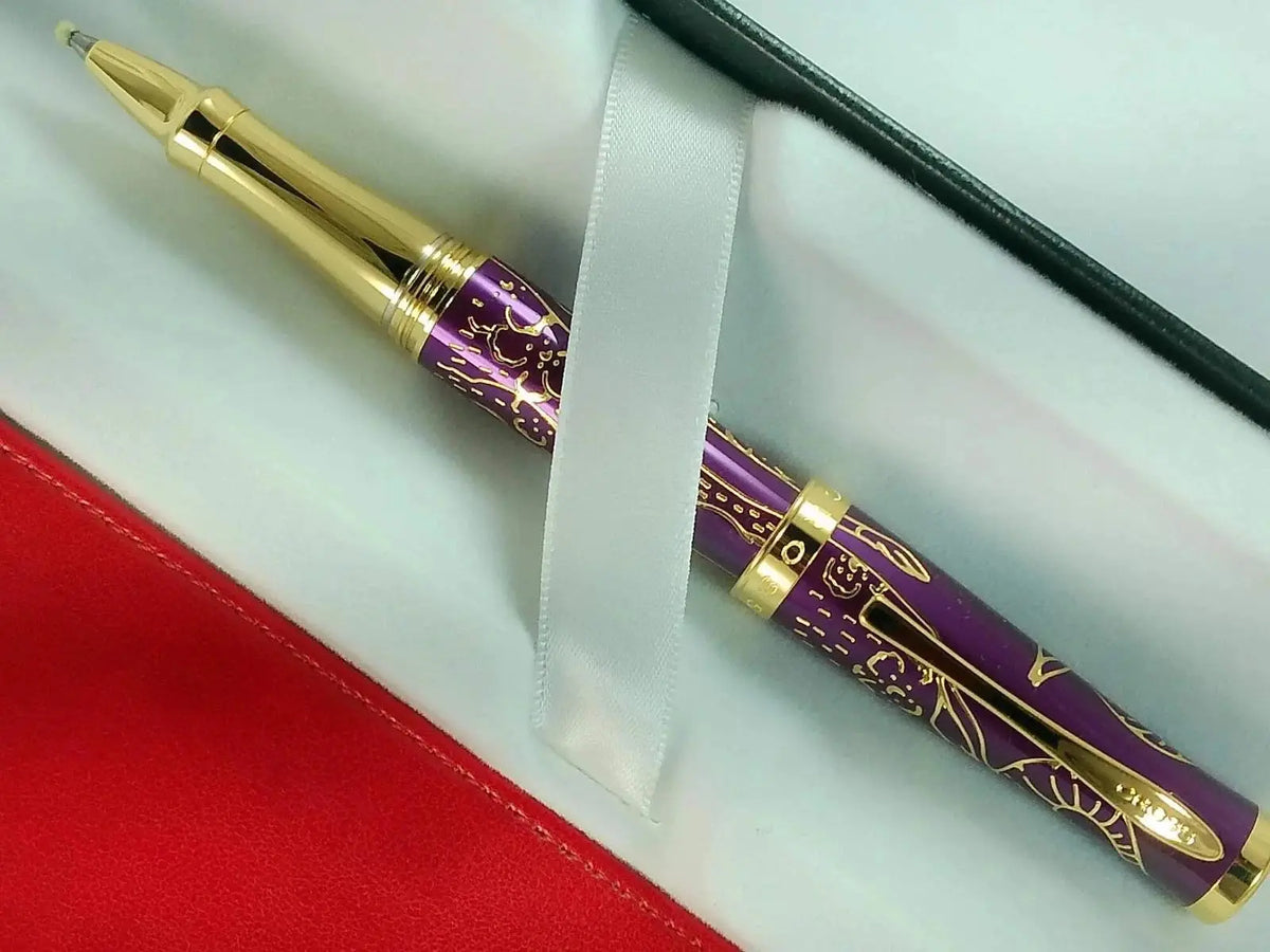 Cross Sauvage 2021 Year of the Ox Special-Edition, Hand-polished Translucent Plum lacquer finish with deep-etched Ox engraving, 23KT Gold Inlays and Appointments Selectip Rollerball Pen and Pouch cross