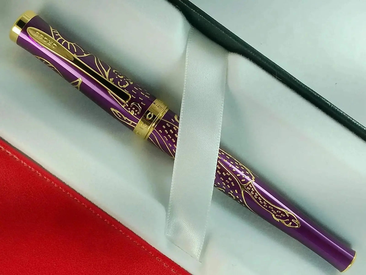 Cross Sauvage 2021 Year of the Ox Special-Edition, Hand-polished Translucent Plum lacquer finish with deep-etched Ox engraving, 23KT Gold Inlays and Appointments Selectip Rollerball Pen and Pouch cross