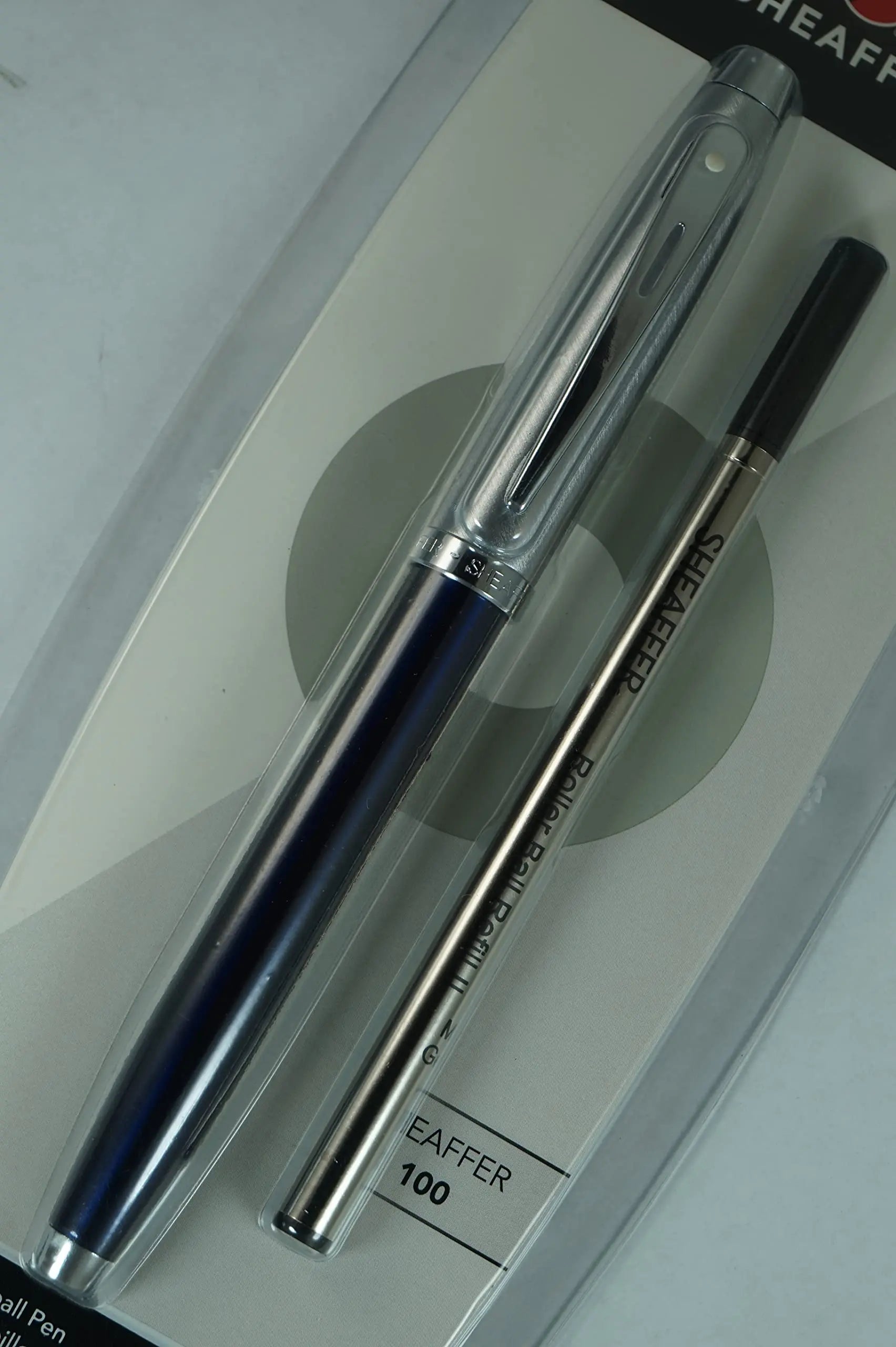 Sheaffer 100 Pearlescent Metallic Blue with Nickel appointments Signature Mid Band and Dot of excellence, Medium Point Rollerball Pen. Very solid and Responsive - crosspenmall.com