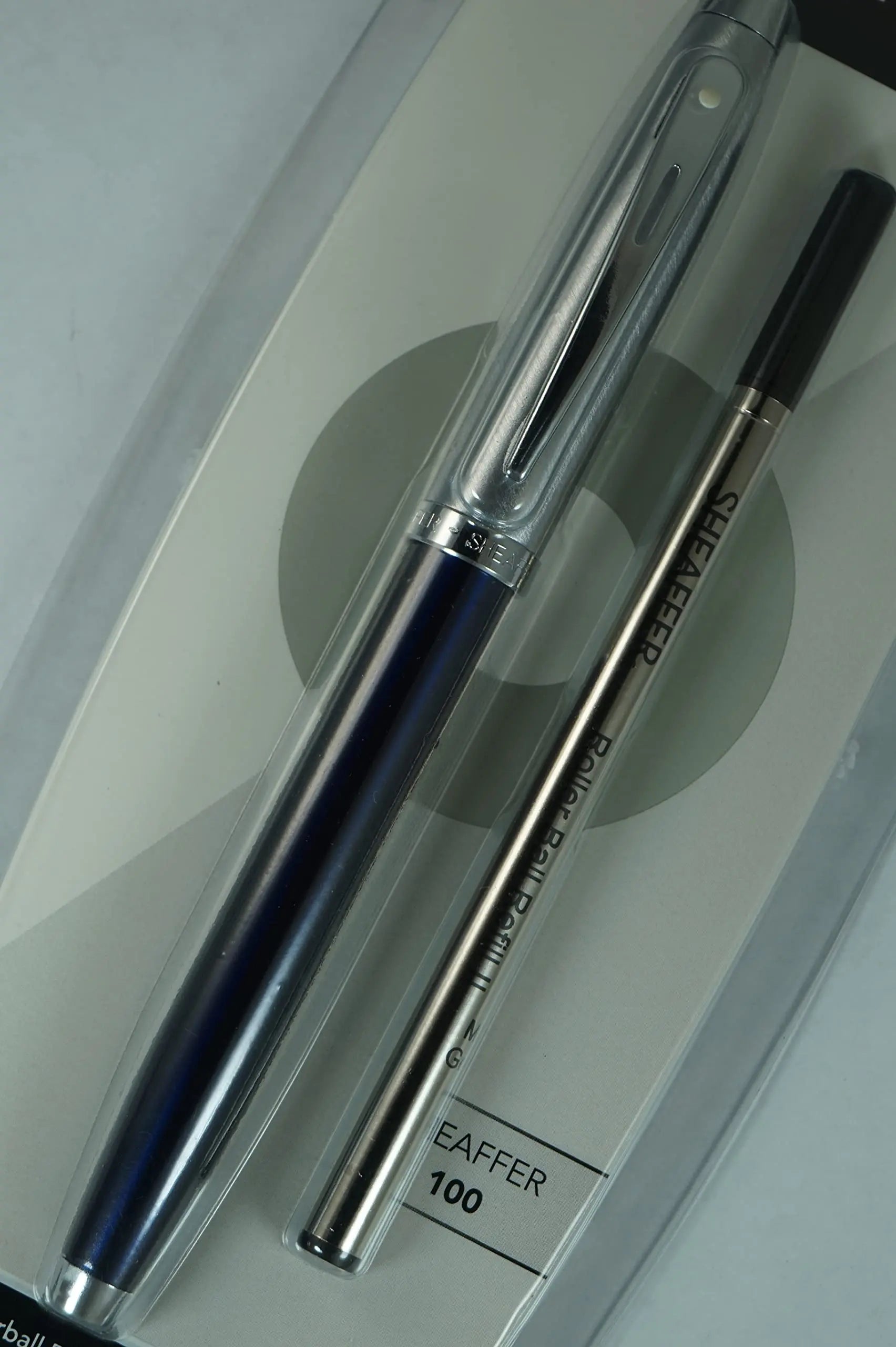 Sheaffer 100 Pearlescent Metallic Blue with Nickel appointments Signature Mid Band and Dot of excellence, Medium Point Rollerball Pen. Very solid and Responsive - crosspenmall.com