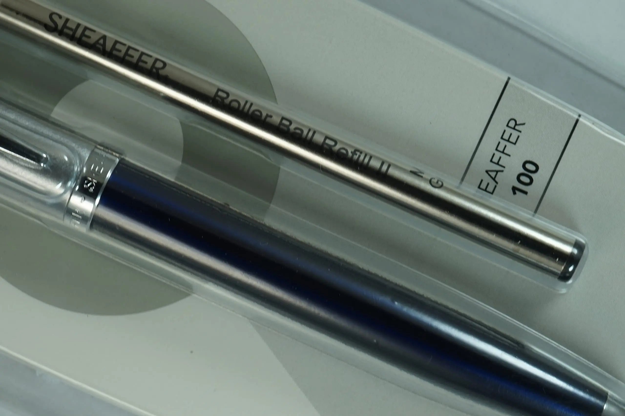 Sheaffer 100 Pearlescent Metallic Blue with Nickel appointments Signature Mid Band and Dot of excellence, Medium Point Rollerball Pen. Very solid and Responsive - crosspenmall.com