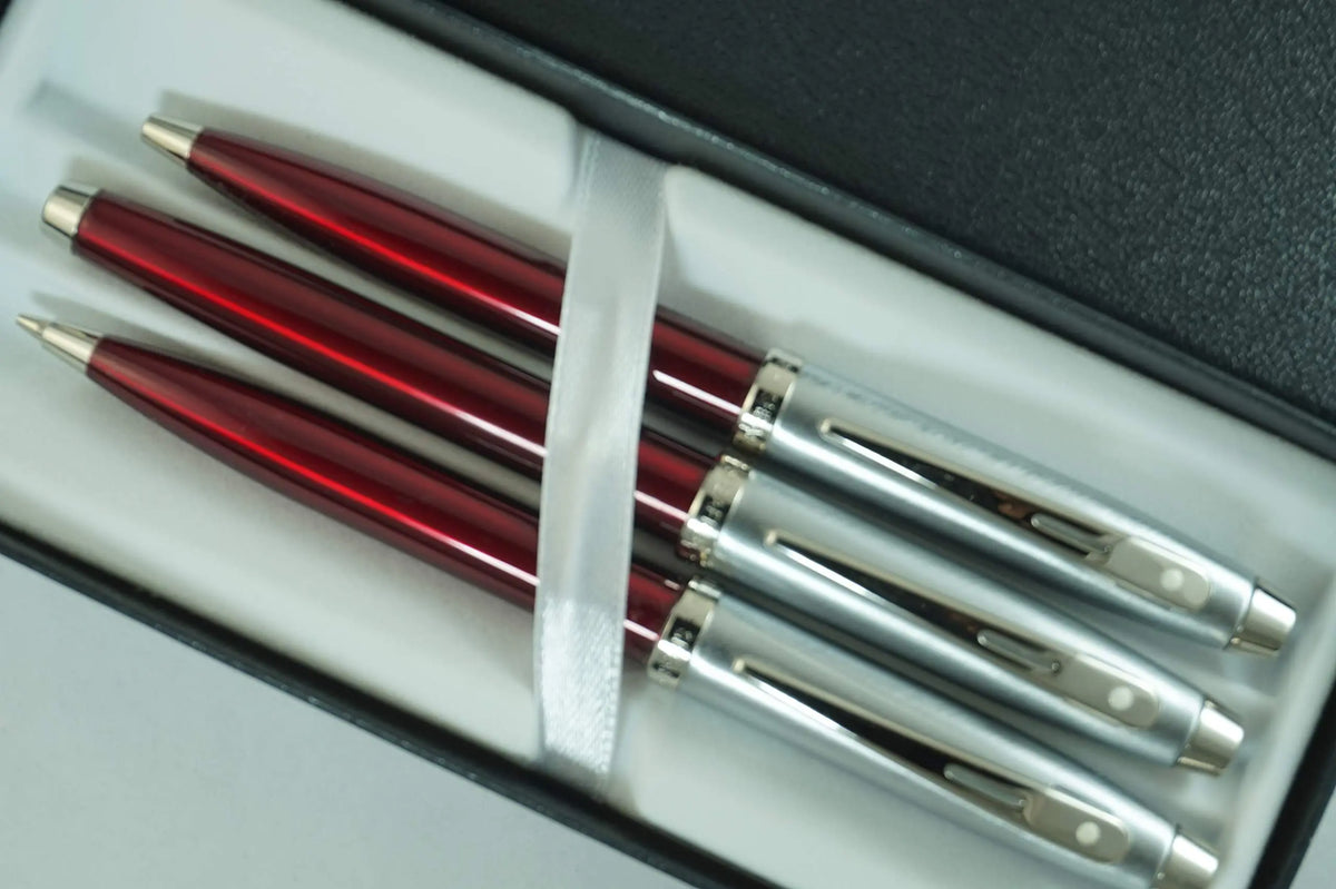 Sheaffer 100 Trio of Red Translucent Medium fountain pen, Ballpoint pen and 0.7MM Pencil with Nickel appointments set. Solid and Responsive Mechanical Set dot of excellence. cross