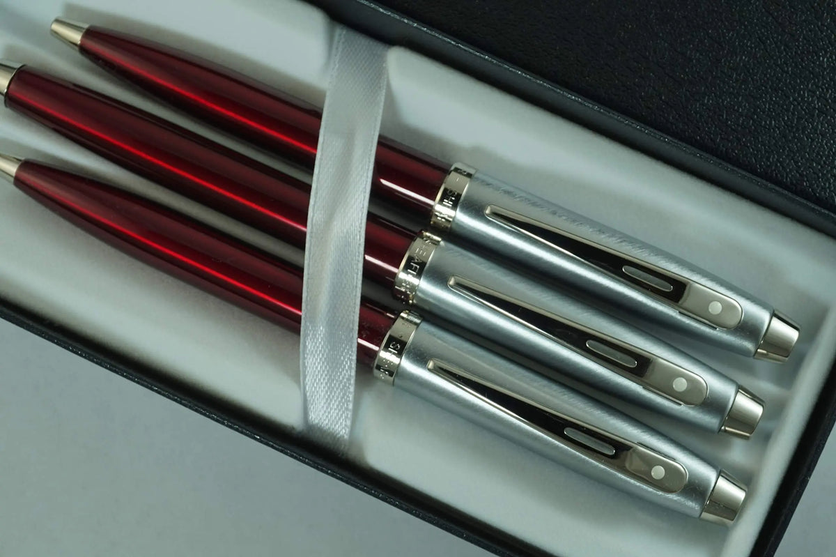 Sheaffer 100 Trio of Red Translucent Medium fountain pen, Ballpoint pen and 0.7MM Pencil with Nickel appointments set. Solid and Responsive Mechanical Set dot of excellence. cross