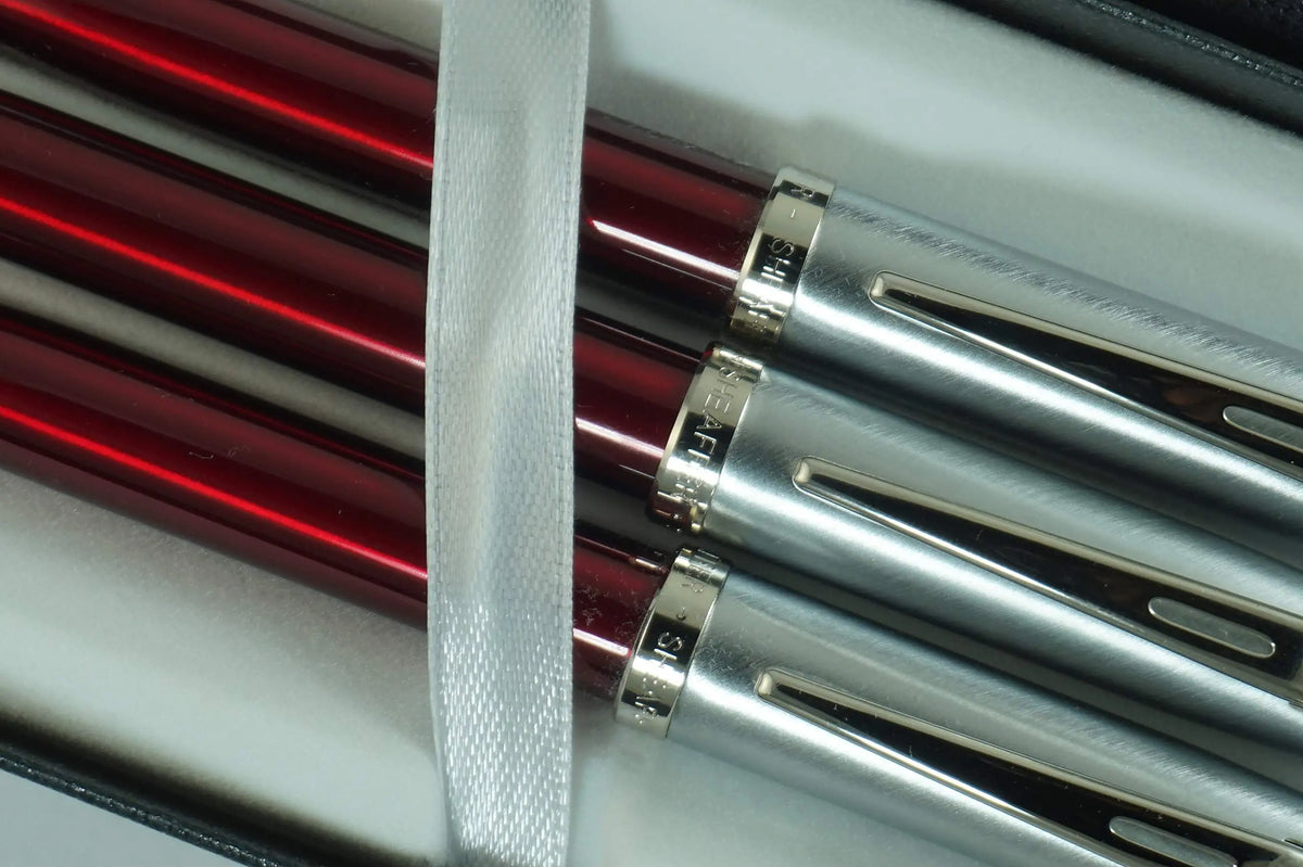 Sheaffer 100 Trio of Red Translucent Medium fountain pen, Ballpoint pen and 0.7MM Pencil with Nickel appointments set. Solid and Responsive Mechanical Set dot of excellence. cross