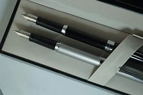 Sheaffer Sagaris Duo of Black Lacquer with Medium Stainless Steel Nib Fountain Pen and Beige Silver with Medium Stainless Steel Nib Fountain Pen for him and her. Sheaffer