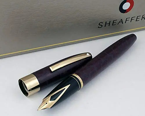 Sheaffer made in the USA Legacy Heritage Look of Leather Burgundy Barrel, 22KT Gold Appointment and Solid 18KT Medium nib Fountain pen. Made in Iowa, USA Sheaffer