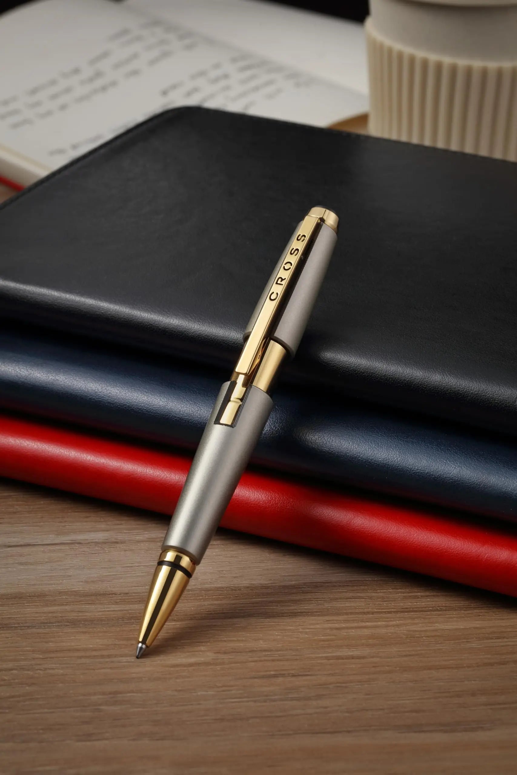 Sonic Titanium Lacquer Rollerball Pen with Gold PVD Appointments by A.T. Cross Cross